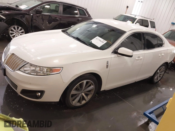 2012 Lincoln MKS with VIN 1LNHL9ER2CG803230, listed as a IAAI auction lot 41734620 with 66,585 mi miles. Bid and sale history available at carsss.com. Image 18.