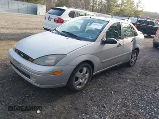 2004 Ford Focus ZTS with VIN 1FAFP38Z74W154059, listed as a IAAI auction lot 41695294 with 146,270 mi miles and . Bid and sale history available at carsss.com. Image 2.