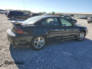 2000 Pontiac Grand Am GT with VIN 1G2NW52E9YM769146, listed as a Copart auction lot 76117814 with 94,122 mi miles and Clean Title. Bid and sale history available at carsss.com. Image 3.
