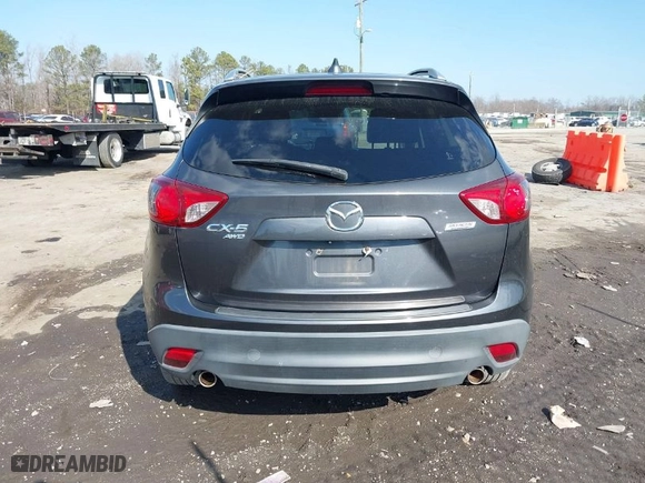 2015 Mazda CX-5 Grand Touring with VIN JM3KE4DY0F0489954, listed as a IAAI auction lot 41500838 with NaN miles. Bid and sale history available at carsss.com. Image 16.