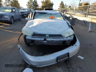 2004 Saturn L with VIN 1G8JC54F34Y510089, listed as a Copart auction lot 79877034 with Not Provided miles and Non Repairable. Bid and sale history available at carsss.com. Image 5.