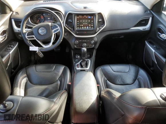 2017 Jeep Cherokee Trailhawk L Plus with VIN 1C4PJMBS1HD237067, listed as a Copart auction lot 77696854 with 102,160 mi miles and Salvage Title. Bid and sale history available at carsss.com. Image 8.