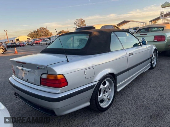 1999 BMW 3 Series M3 with VIN WBSBK0331XEC40420, listed as a Copart auction lot 82169664 with 129,936 mi miles and Clean Title. Bid and sale history available at carsss.com. Image 3.