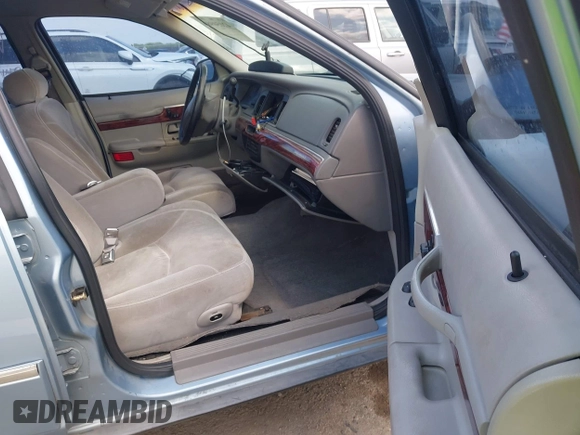 2000 Mercury Grand Marquis LS z VIN 2MEFM75W1YX673105, wystawiony jako IAAI lot #42050980 z przebiegiem 154 944 mil mil oraz . Historia ofert i sprzedaży dostępna na DreamBid. Obrazek 5.