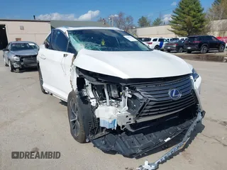 2016 Lexus RX 450h with VIN 2T2BGMCA1GC004070, listed as a IAAI auction lot 42086395 with 172,376 mi miles and . Bid and sale history available at DreamBid. Image 6.