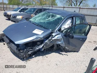 2024 Toyota Corolla Cross L with VIN 7MUAAABG5RV096239, listed as a IAAI auction lot 42105087 with 13,747 mi miles and . Bid and sale history available at DreamBid. Image 2.