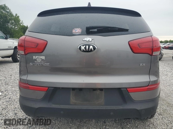 2014 Kia Sportage EX with VIN KNDPCCAC9E7570710, listed as a Copart auction lot 55024805 with 69,367 mi miles and Salvage title. Bid and sale history available at DreamBid. Image 6.