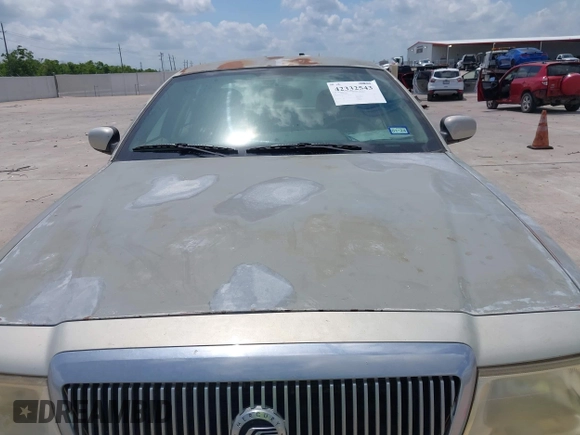 2004 Mercury Grand Marquis LS Premium z VIN 2MEFM75WX4X607033, wystawiony jako IAAI lot #42332543 z przebiegiem 179 297 mil mil oraz . Historia ofert i sprzedaży dostępna na DreamBid. Obrazek 6.