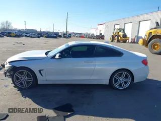 2014 BMW 4 Series 435i with VIN WBA3R1C56EK191996, listed as a IAAI auction lot 41450981 with 125,352 mi miles and . Bid and sale history available at carsss.com. Image 14.