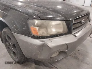 2003 Subaru Forester XS with VIN JF1SG65643H755247, listed as a IAAI auction lot 41836577 with 184,677 mi miles. Bid and sale history available at carsss.com. Image 6.
