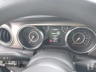2019 Jeep Wrangler Unlimited Sport Altitude with VIN 1C4HJXDG0KW559807, listed as a IAAI auction lot 41790082 with 34,221 mi miles and . Bid and sale history available at DreamBid. Image 7.