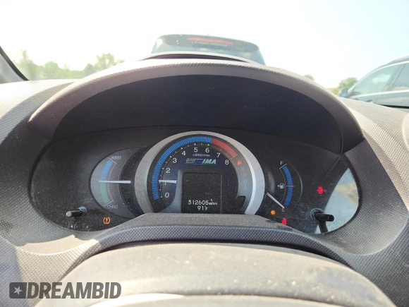 2010 Honda Insight EX с VIN JHMZE2H75AS024918, выставлен на аукционе Copart как лот 66526265 с пробегом 312 605 миль миль и Списание • Salvage title. История ставок и продаж доступна на DreamBid. Изображение 9.