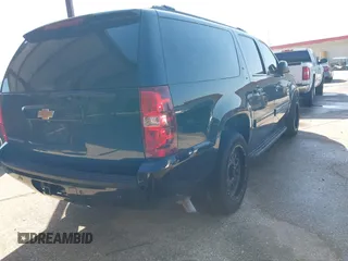 2014 Chevrolet Suburban LT with VIN 1GNSCJE03ER203943, listed as a IAAI auction lot 41982720 with 288,135 mi miles and . Bid and sale history available at DreamBid. Image 4.