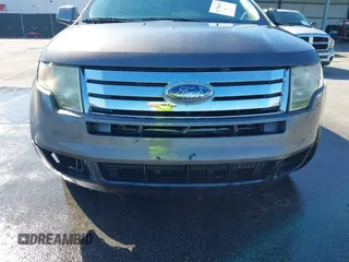 2010 Ford Edge SEL with VIN 2FMDK3JCXABA50115, listed as a IAAI auction lot 41758678 with 207,033 mi miles. Bid and sale history available at carsss.com. Image 13.