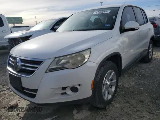 2010 Volkswagen Tiguan SEL with VIN WVGAV7AX0AW002187, listed as a Copart auction lot 83902294 with 64,188 mi miles and Salvage title. Bid and sale history available at DreamBid. Image 1.