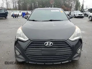 2013 Hyundai Veloster Turbo z VIN KMHTC6AE4DU155792, wystawiony jako Copart lot #83189014 z przebiegiem 70 033 mil mil oraz Szkoda całkowita • Salvage title. Historia ofert i sprzedaży dostępna na DreamBid. Obrazek 5.