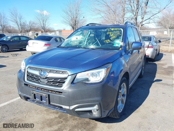 2018 Subaru Forester Touring with VIN JF2SJAWCXJH467976, listed as a IAAI auction lot 41744472 with 98,919 mi miles. Bid and sale history available at carsss.com. Image 6.
