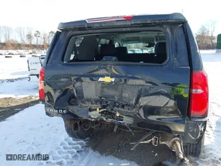 2019 Chevrolet Tahoe LT with VIN 1GNSKBKC7KR138999, listed as a IAAI auction lot 41339420 with 74,297 mi miles. Bid and sale history available at carsss.com. Image 16.