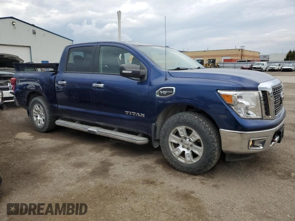 2017 Nissan Titan SV with VIN 1N6AA1EJXHN534790, listed as a Copart auction lot 52567735 with 184,884 mi miles and Salvage Title. Bid and sale history available at DreamBid. Image 4.