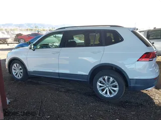 2018 Volkswagen Tiguan S with VIN 3VV1B7AX3JM091025, listed as a IAAI auction lot 41395912 with 58,840 mi miles. Bid and sale history available at carsss.com. Image 14.