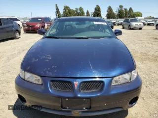 2000 Pontiac Grand Prix GT z VIN 1G2WP12K7YF189639, wystawiony jako Copart lot #57891595 z przebiegiem 70 055 mil mil oraz Tytuł czysty. Historia ofert i sprzedaży dostępna na DreamBid. Obrazek 5.