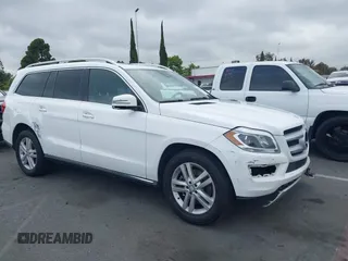 2014 Mercedes-Benz GL 450 z VIN 4JGDF7CE0EA424081, wystawiony jako IAAI lot #42359465 z przebiegiem 145 363 mil mil oraz . Historia ofert i sprzedaży dostępna na DreamBid. Obrazek 1.