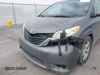2012 Toyota Sienna LE AAS with VIN 5TDKK3DC0CS192952, listed as a IAAI auction lot 41694554 with 179,277 mi miles. Bid and sale history available at carsss.com. Image 6.