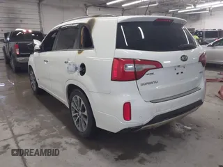 2015 Kia Sorento SX Limited with VIN 5XYKWDA70FG619582, listed as a IAAI auction lot 41558289 with 115,222 mi miles. Bid and sale history available at carsss.com. Image 3.