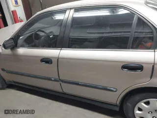2000 Honda Civic LX with VIN 2HGEJ6674YH532404, listed as a IAAI auction lot 41998834 with 94,504 mi miles. Bid and sale history available at carsss.com. Image 14.