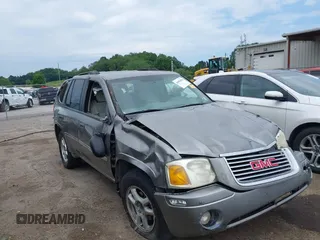 2007 GMC Envoy SLE with VIN 1GKDS13S272278285, listed as a IAAI auction lot 40006486 with 158,109 mi miles. Bid and sale history available at carsss.com. Image 6.