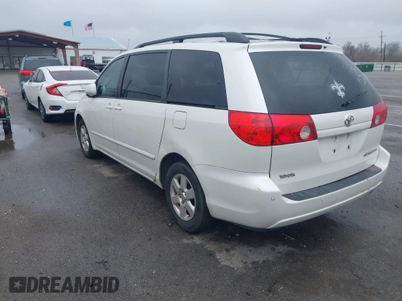 2010 Toyota Sienna XLE with VIN 5TDYK4CC1AS330349, listed as a IAAI auction lot 41607065 with 258,145 mi miles and . Bid and sale history available at carsss.com. Image 3.