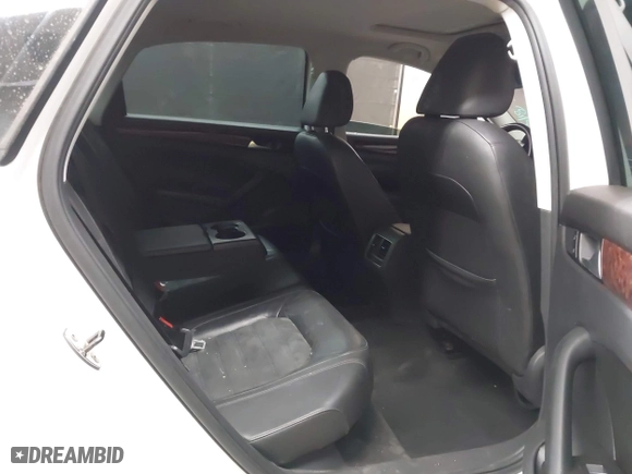 2013 Volkswagen Passat TDI SEL Premium with VIN 1VWCN7A39DC011421, listed as a IAAI auction lot 42042189 with 141,670 mi miles. Bid and sale history available at carsss.com. Image 8.