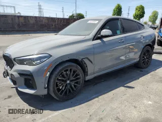 2022 BMW X6 xDrive40i z VIN 5UXCY6C01N9M95573, wystawiony jako Copart lot #54049805 z przebiegiem 24 031 mil mil oraz Szkoda całkowita • Salvage title. Historia ofert i sprzedaży dostępna na DreamBid. Obrazek 1.