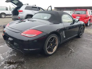 2012 Porsche Boxster with VIN WP0CA2A88CS710105, listed as a IAAI auction lot 41155672 with 108,103 mi miles. Bid and sale history available at carsss.com. Image 4.