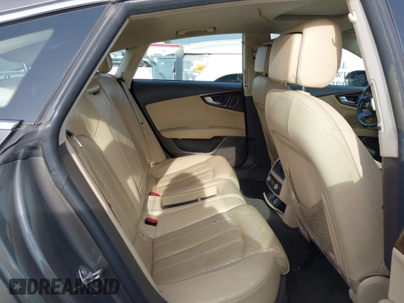 2012 Audi A7 Prestige с VIN WAU2GAFC7CN122113, выставлен на аукционе IAAI как лот 42111441 с пробегом 149 617 миль миль и . История ставок и продаж доступна на DreamBid. Изображение 8.