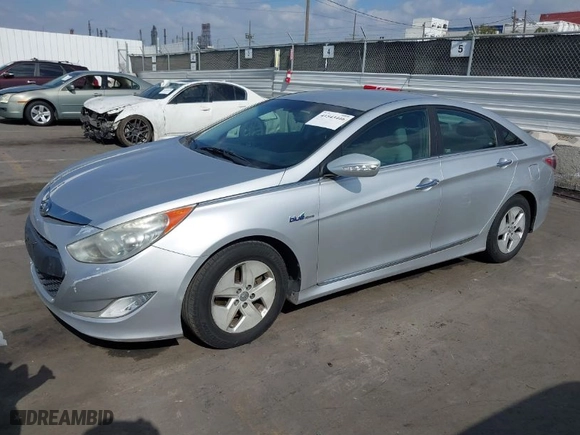 2012 Hyundai Sonata Hybrid with VIN KMHEC4A48CA027852, listed as a IAAI auction lot 41543446 with 163,504 mi miles. Bid and sale history available at carsss.com. Image 2.