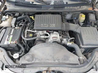 1999 Jeep Grand Cherokee Limited with VIN 1J4GW68N5XC684157, listed as a IAAI auction lot 42104283 with 164,506 mi miles. Bid and sale history available at carsss.com. Image 10.