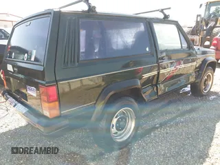 1996 Jeep Cherokee z VIN 1J4FT27S2TL147793, wystawiony jako IAAI lot #41568265 z przebiegiem 223 742 mil mil oraz . Historia ofert i sprzedaży dostępna na DreamBid. Obrazek 4.