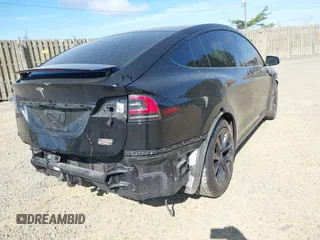 2022 Tesla Model X with VIN 7SAXCAE59NF346186, listed as a IAAI auction lot 41893923 with Not Provided miles and . Bid and sale history available at DreamBid. Image 4.