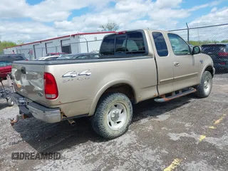 2000 Ford F-150 XL with VIN 1FTRX18L9YNB70363, listed as a IAAI auction lot 42140312 with 226,686 mi miles and . Bid and sale history available at DreamBid. Image 4.