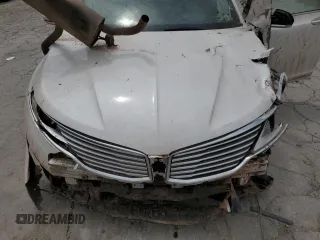 2014 Lincoln MKZ Hybrid с VIN 3LN6L2LU3ER833502, выставлен на аукционе Copart как лот 55996595 с пробегом Не указан миль и Списание • Salvage title. История ставок и продаж доступна на DreamBid. Изображение 11.