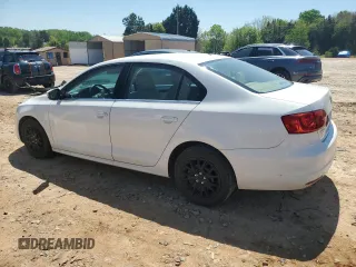 2013 Volkswagen Jetta SE с VIN 3VWDX7AJ0DM221837, выставлен на аукционе Copart как лот 52502565 с пробегом 148 730 миль миль и Списание • Salvage title. История ставок и продаж доступна на DreamBid. Изображение 2.