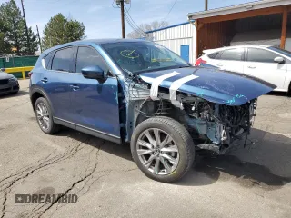 2021 Mazda CX-5 Grand Touring Reserve with VIN JM3KFBAY8M0384498, listed as a Copart auction lot 52013445 with 20,469 mi miles and Salvage Title. Bid and sale history available at carsss.com. Image 4.