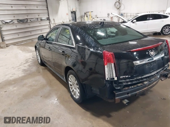 2011 Cadillac CTS z VIN 1G6DC5EY0B0167517, wystawiony jako IAAI lot #41657144 z przebiegiem Nie podano mil oraz . Historia ofert i sprzedaży dostępna na DreamBid. Obrazek 3.