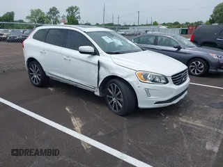 2014 Volvo XC60 3.2L z VIN YV4952DL3E2557034, wystawiony jako IAAI lot #42274824 z przebiegiem 97 293 mil mil oraz . Historia ofert i sprzedaży dostępna na DreamBid. Obrazek 1.