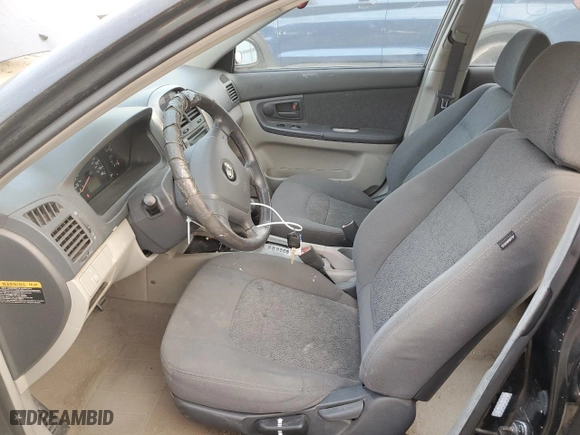 2005 Kia Spectra with VIN KNAFE161255088283, listed as a Copart auction lot 73654744 with 169,947 mi miles and Salvage Title. Bid and sale history available at carsss.com. Image 7.