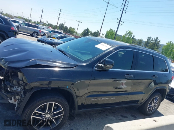 2018 Jeep Grand Cherokee Laredo E z VIN 1C4RJEAG9JC131344, wystawiony jako IAAI lot #42218060 z przebiegiem 126 639 mil mil oraz . Historia ofert i sprzedaży dostępna na DreamBid. Obrazek 15.
