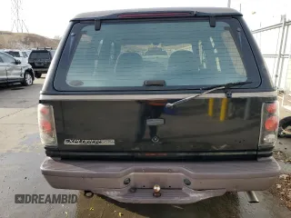 1997 Ford Explorer Sport z VIN 1FMDU24E2VUB68077, wystawiony jako Copart lot #82446534 z przebiegiem 196 458 mil mil oraz Szkoda całkowita • Salvage title. Historia ofert i sprzedaży dostępna na DreamBid. Obrazek 6.