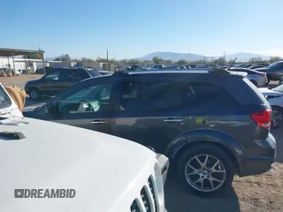 2014 Dodge Journey Limited with VIN 3C4PDDDG2ET175023, listed as a IAAI auction lot 41646669 with 112,663 mi miles and . Bid and sale history available at carsss.com. Image 14.