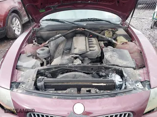 2004 BMW Z4 2.5i with VIN 4USBT33544LS50607, listed as a IAAI auction lot 42055929 with 156,585 mi miles. Bid and sale history available at carsss.com. Image 10.